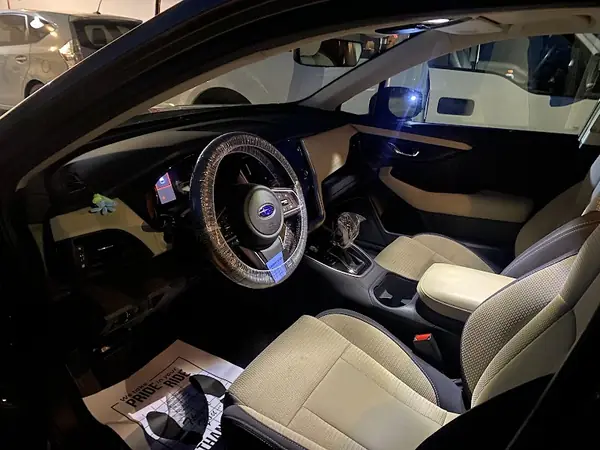 Owner's tan interior dash after an Aqulux detail